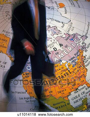 Businessman and globe, CG, composition, blurred motion View Large Photo Image Stock Photo - Businessman and globe, CG, composition, blurred motion. Fotosearch