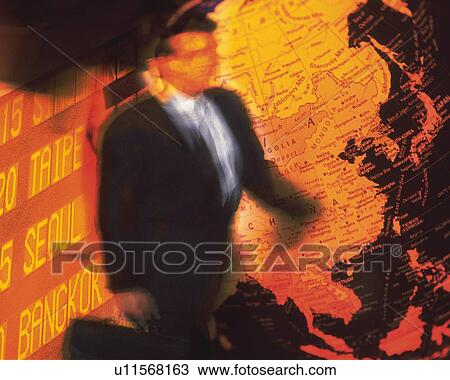 Stock Image - Businessman and image of globe and airline timetables, CG, composition, blurred motion, toned image. Fotosearch