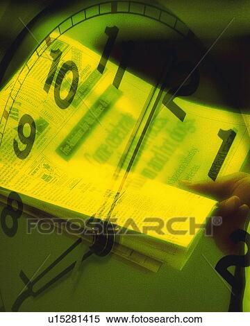 Stock Photography - Businessman holding folded newspaper and image of clock, CG, composition, toned image, close up. Fotosearch