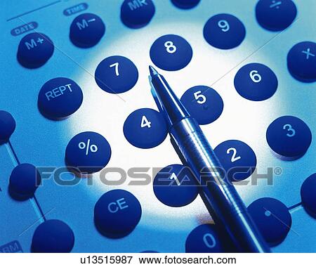 Calculator and pen, close up, high angle view View Large Photo Image Stock Photo - Calculator and pen, close up, high angle view. Fotosearch