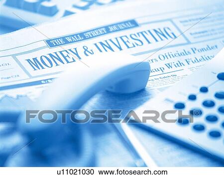 Calculator and phone receiver on newspaper, toned image, high angle view, close up, soft focus View Large Photo Image Stock Image - Calculator and phone receiver on newspaper, toned image, high angle view, close up, soft focus. Fotosearch