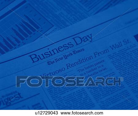 Stock Image - Financial press, high angle view, close up, soft focus, toned image. Fotosearch