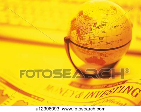 Globe, financial press and computer keyboard on desk, high angle view, close up, soft focus, toned image View Large Photo Image Stock Image - Globe, financial press and computer keyboard on desk, high angle view, close up, soft focus, toned image. Fotosearch