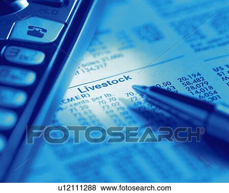 Pen and mobile phone on financial press, high angle view, close up, toned image View Large Photo Image Stock Photo - Pen and mobile phone on financial press, high angle view, close up, toned image. Fotosearch