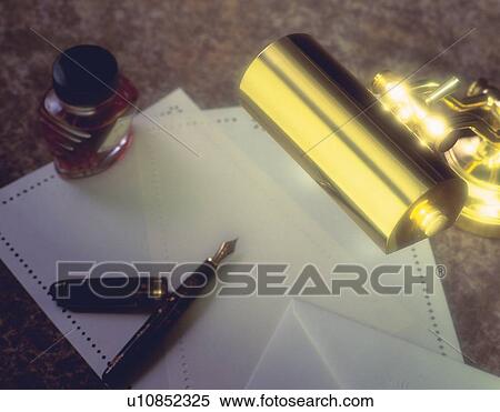 Stationeries and table lamp, high angle view, close up View Large Photo Image Stock Photography - Stationeries and table lamp, high angle view, close up. Fotosearch