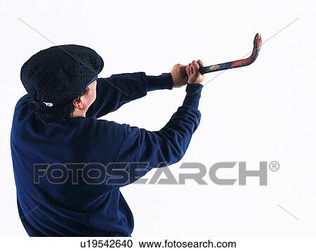 Stock Image - Burglar breaking in, Rear View. Fotosearch