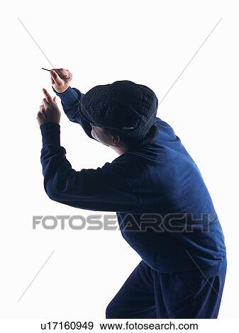 Stock Photo - Burglar breaking in, Side View. Fotosearch