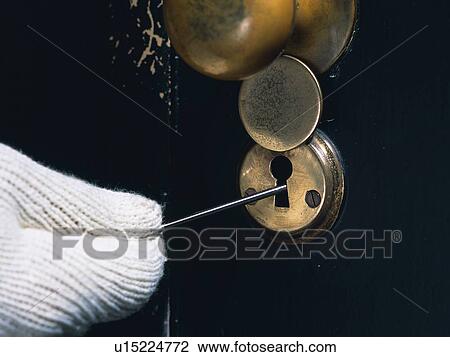 Stock Image - Hand breaking in, Close Up. Fotosearch