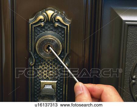 Stock Image - Hand breaking in, Close Up. Fotosearch