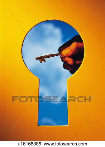 Key hole and a hand with a Key behind, Composite View Large Photo Image Stock Photography - Key hole and a hand with a Key behind, Composite. Fotosearch