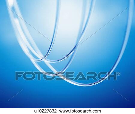 Stock Image - Arched fiber optics, close up. Fotosearch