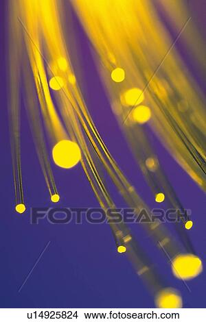 Bunch of illuminated fiber optics, close up View Large Photo Image Picture - Bunch of illuminated fiber optics, close up. Fotosearch