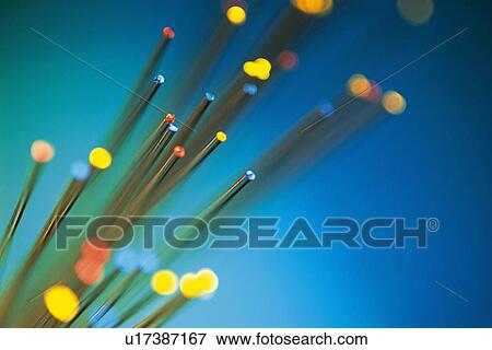 Stock Photo - Illuminated fiber optics, close up. Fotosearch