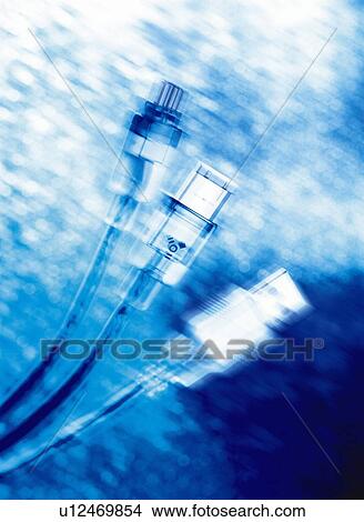 Picture - Three computer cables, close up, blurred motion, toned image. Fotosearch