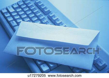Stock Photography - Keyboard and a Letter, Close Up, Toned Image. Fotosearch