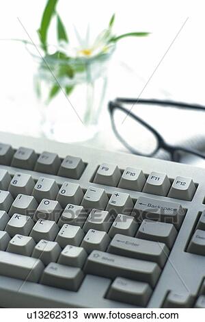 Keyboard, Coffee Cup and Glasses on the Desk, High Angle View View Large Photo Image Stock Image - Keyboard, Coffee Cup and Glasses on the Desk, High Angle View. Fotosearch