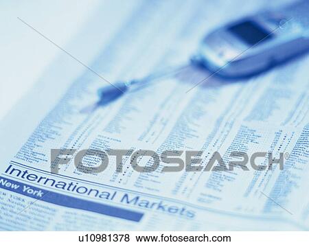 Newspaper and Mobile Phone, High Angle View, Toned Image View Large Photo Image Stock Photo - Newspaper and Mobile Phone, High Angle View, Toned Image. Fotosearch