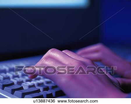 Stock Photograph - Using the Keyboard, Typing, Close Up. Fotosearch