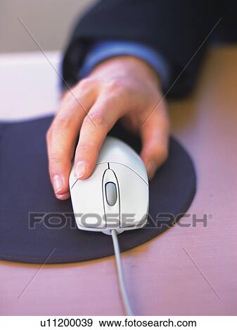 Stock Photo - Using the Mouse, High Angle View. Fotosearch