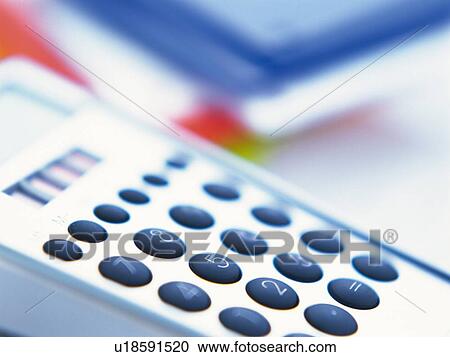 Stock Image - Calculator, Close Up, High Angle View. Fotosearch
