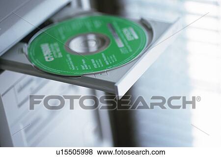 CD and computer, Pin Focus, High Angle View View Large Photo Image Stock Photo - CD and computer, Pin Focus, High Angle View. Fotosearch