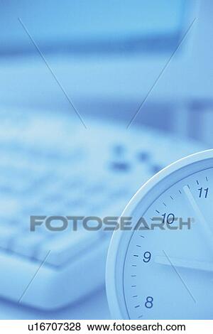 Clock and computer, Close Up, Pin Focus View Large Photo Image Stock Photo - Clock and computer, Close Up, Pin Focus. Fotosearch