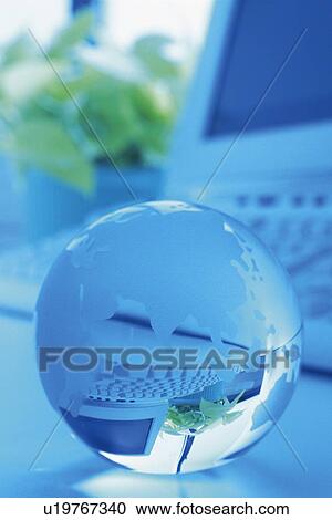 Glass globe and computer, Close Up, Pin Focus, Toned Image View Large Photo Image Stock Image - Glass globe and computer, Close Up, Pin Focus, Toned Image. Fotosearch