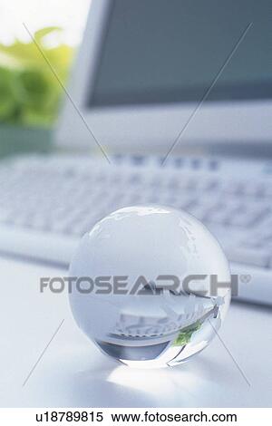 Glass globe and computer, Pin Focus View Large Photo Image Stock Photography - Glass globe and computer, Pin Focus. Fotosearch