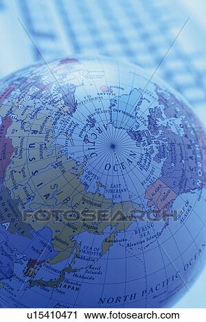 Stock Image - Globe and keyboard, Close Up, Pin Focus, High Angle View. Fotosearch