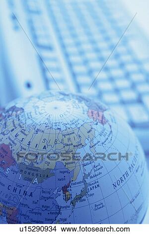 Picture - Globe and keyboard, Pin Focus, High Angle View. Fotosearch