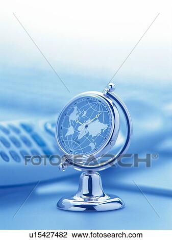 Stock Image - Globe like clock, Close Up, Pin Focus. Fotosearch