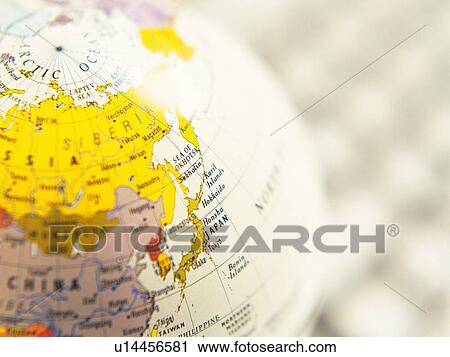 Stock Image - Globe, Pin Focus, High Angle View. Fotosearch