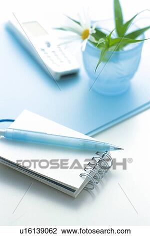 Note pad and flower in a glass, High Angle View View Large Photo Image Stock Image - Note pad and flower in a glass, High Angle View. Fotosearch