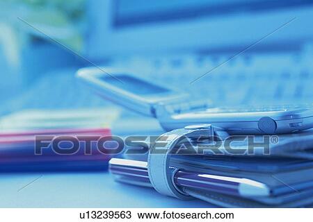 Scheduler and mobile phone, Close Up, Pin Focus, Toned Image View Large Photo Image Stock Image - Scheduler and mobile phone, Close Up, Pin Focus, Toned Image. Fotosearch