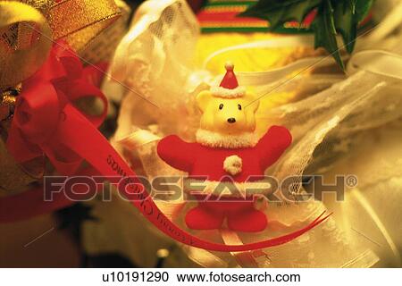Bear Santa Claus among ribbons, front view View Large Photo Image Stock Image - Bear Santa Claus among ribbons, front view. Fotosearch