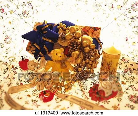 Stock Photo - Christmas ornaments and presents, high angle view. Fotosearch