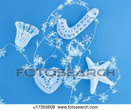 Christmas ornaments, blue background, high angle view View Large Photo Image Stock Photo - Christmas ornaments, blue background, high angle view. Fotosearch