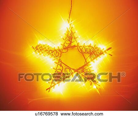 Illuminated Christmas ornament, front view View Large Photo Image Stock Photo - Illuminated Christmas ornament, front view. Fotosearch