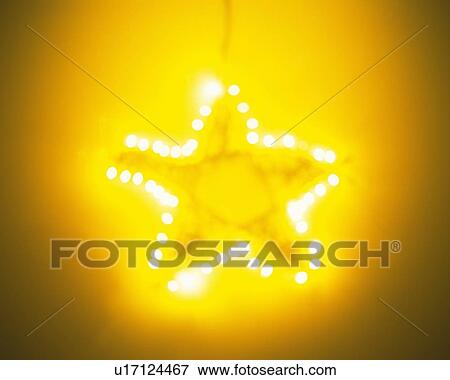 Illuminated Christmas ornament, front view, soft focus View Large Photo Image Stock Photo - Illuminated Christmas ornament, front view, soft focus. Fotosearch