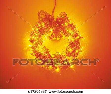 Illuminated Christmas wreath, front view View Large Photo Image Stock Photo - Illuminated Christmas wreath, front view. Fotosearch