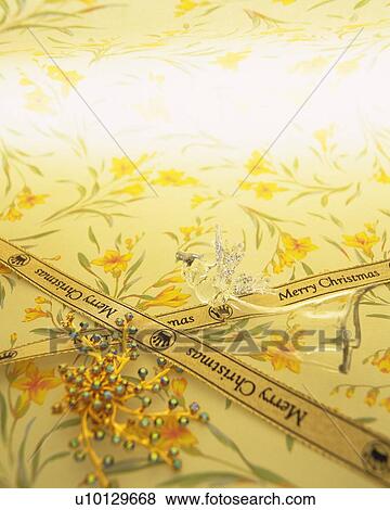 Ribbons printed "Merry Christmas", high angle view View Large Photo Image Stock Photo - Ribbons printed "Merry Christmas", high angle view. Fotosearch