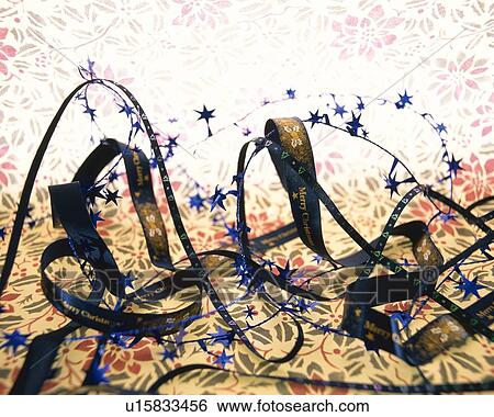 Ribbons printed "Merry Christmas", high angle view View Large Photo Image Stock Photograph - Ribbons printed "Merry Christmas", high angle view. Fotosearch