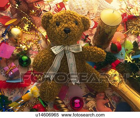 Teddy bear among Christmas ornaments, high angle view View Large Photo Image Stock Photography - Teddy bear among Christmas ornaments, high angle view. Fotosearch