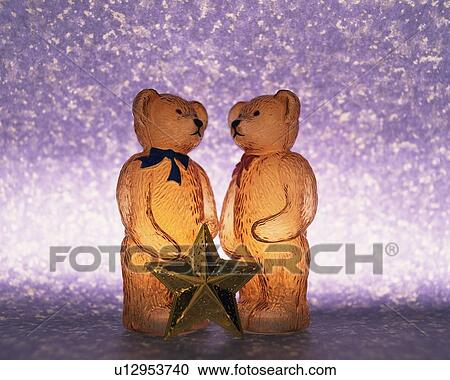 Two teddy bears and a star, low angle view, composition View Large Photo Image Stock Image - Two teddy bears and a star, low angle view, composition. Fotosearch