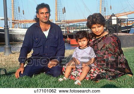 Stock Image - A Pakistani family at a harbor. Fotosearch