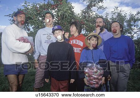 Family eating apples View Large Photo Image Stock Image - Family eating apples. Fotosearch