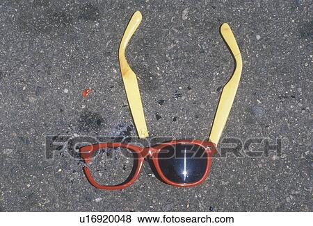 Stock Photo - Broken sunglasses. Fotosearch