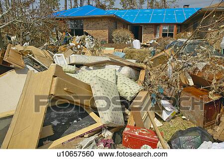Debris in front of house heavily hit by Hurricane Ivan View Large Photo Image Stock Image - Debris in front of house heavily hit by Hurricane Ivan. Fotosearch