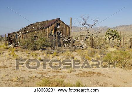 Old mining building along mining road View Large Photo Image Stock Photo - Old mining building along mining road. Fotosearch