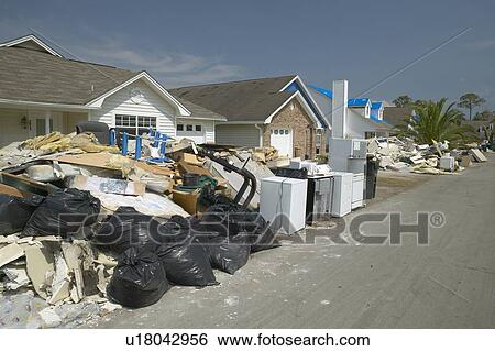 Row of suburban houses with debris after Hurricane Ivan View Large Photo Image Stock Photograph - Row of suburban houses with debris after Hurricane Ivan. Fotosearch